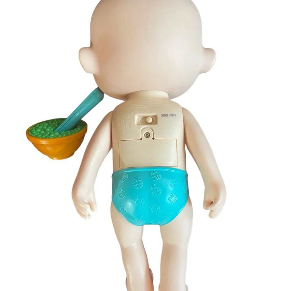 Cocomelon Doll with peas and spoon